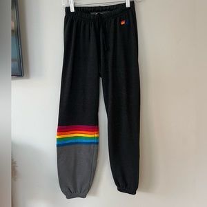 Aviator Nation rainbow stripe with gray cuff. Size small. Charcoal